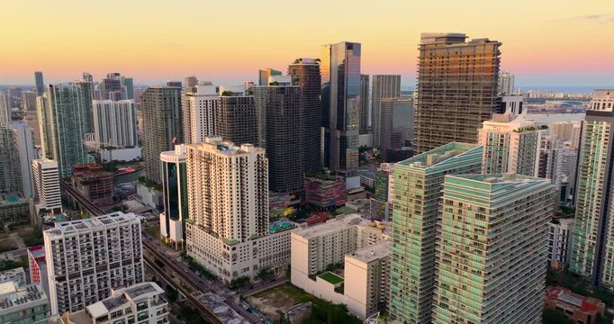 Miami Brickell in Florida, USA at sunset. View from above of skyscraper buildings in downtown district. American megapolis with business financial district.