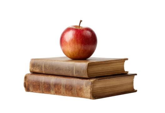 A ripe red apple sits atop two aged, stacked books