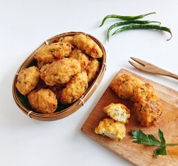Perkedel tahu or fried tofu patties. Made of mixture; mashed tofu, small amount of tapioca flour, spring onion, egg, salt and pepper and deep fried. Crunchy outside,soft inside.