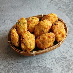 Perkedel tahu or fried tofu patties. Made of mixture; mashed tofu, small amount of tapioca flour, spring onion, egg, salt and pepper and deep fried. Crunchy outside,soft inside.