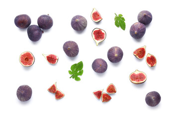 Many fresh ripe figs and leaves on white background