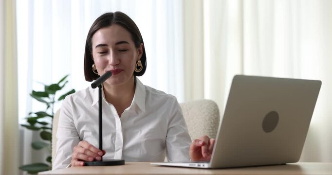 Podcast host recording talk show indoors, view from camera