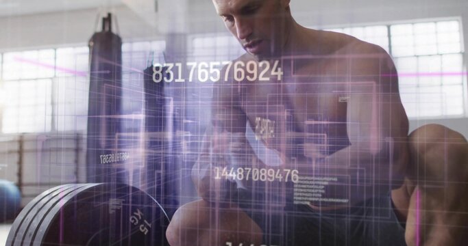 Squatting shirtless man gripping loaded barbell in gym with biometric data overlay
