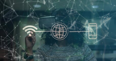 Using VR headset and smartwatch, woman interacting with wifi, globe, phone icons, nodes in tech lab