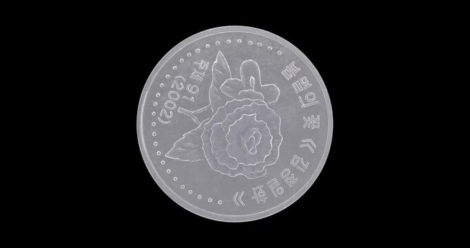 Reverse of North Korea coin 50 chon 2002, isolated in black background. Loopable animation in 4k resolution video