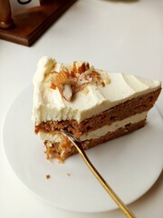  Vanilla almond cake slice on white plate