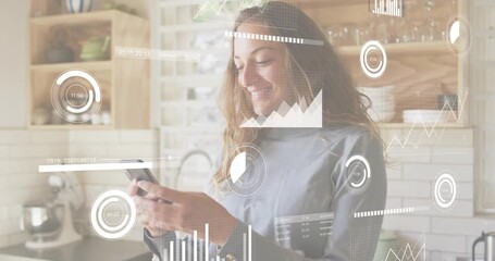 Casual user tapping smartphone in kitchen and activating animated line graph tracking tech metrics