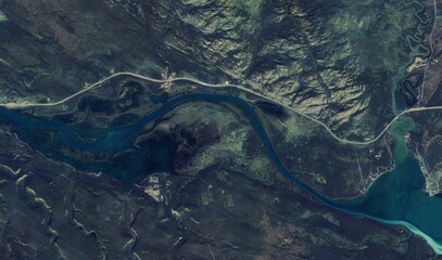 Alaskan River Landscape: High-Resolution Aerial View of Braided River Systems, Tundra, and Mountain Wilderness
