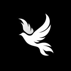 Obraz premium Minimalist white flying dove silhouette on black background, symbolizing peace, freedom, hope, purity, and spirituality.