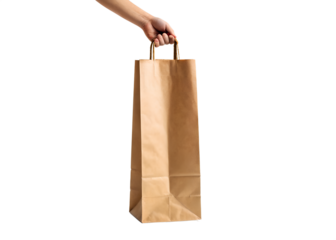 Hand holding a tall narrow brown paper shopping bag with white handles against a solid black background