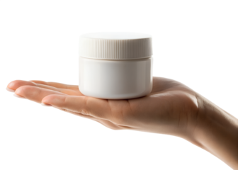 Hand holding a small white plastic container with a ribbed lid against a dark background
