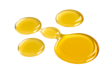 golden liquid drops on white background