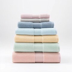Stack of folded towels isolated on pure white background