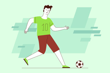 Boy joyfully running while kicking soccer ball. He wearing green jersey with number 10 and brown shorts against green background