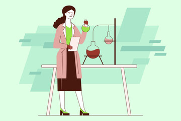 Woman in lab coat standing at table with glassware and liquids. She holding bottle in one hand and clipboard in other, focused on her experiment