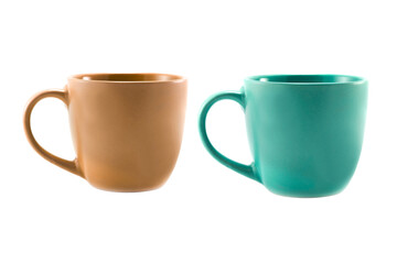 PNG image of Two mugs side by side a tan mug and a teal mug against a black background in a studio setting