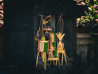 Canang is a Balinese Hindu offering made from coconut leaves and filled with flowers, incense, and...