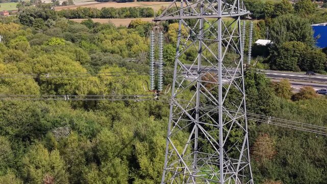 Aerial video of high voltage power lines UK power grid 