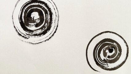 Ink-drawn water ripples, ripples painted with ink and brush, ink wash painting of ripples, round swirl