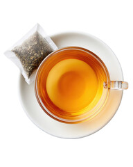 Clear glass cup of tea with single teabag on white plate, warm and inviting, isolated on transparency background