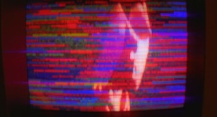 Distorted figure on a faulty TV screen