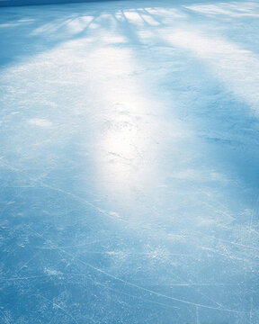 Close up of ice surface showing reflective film with faint scratches, blue tone, winter outdoor, cold, smooth texture