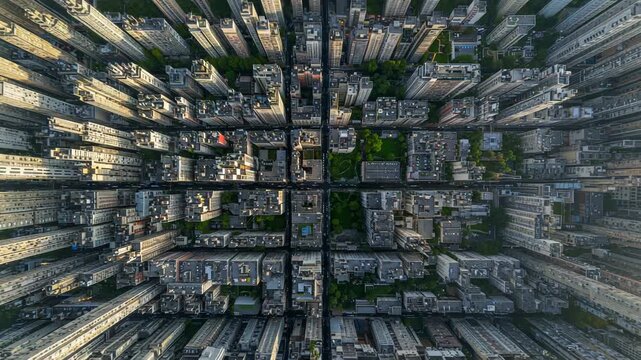 Aerial view of dense urban cityscape with tall buildings