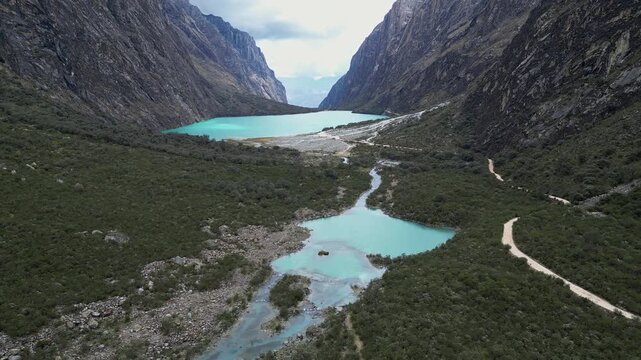 Yungay, Peru: Forward motion drone footage in the Huascar&aacute;n National Park valley captures two lakes, one of them Llanganuco, surrounded by mountains and dramatic landscapes