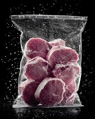 Frozen Meat in Vacuum-Sealed Bag with Water Droplets