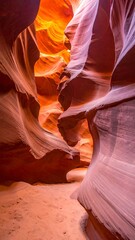 Dramatic sandstone canyon with light creating warm and cool tones