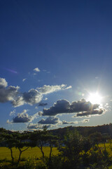 It's a blue sky with sunlight shining through it.