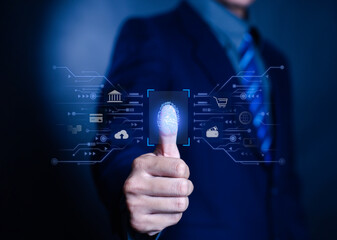 Businessman using biometric fingerprint scanning technology for digital authentication, representing cybersecurity, identity verification, fintech, data protection in modern online business concept.