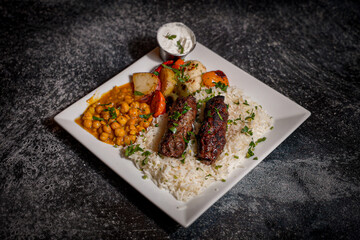 Kuftah Kabob with Rice, Roasted Vegetables, and Chickpeas 