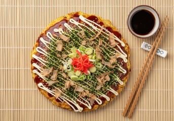 Authentic Japanese Okonomiyaki Pancake with Toppings — Top-View Food Photography