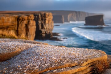 Glistening crystals on rugged coastal rocks, dramatic sea cliffs, ocean.