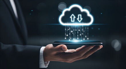 Businessman holding smartphone with cloud upload and data transfer hologram