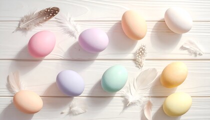 Fototapeta premium Colorful pastel eggs arranged with delicate feathers on a wooden surface, creating a serene spring atmosphere
