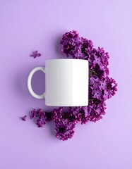 White mug rests amid purple blossoms, on a matching lavender surface