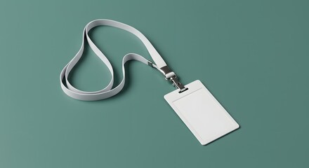 Blank white ID card with lanyard on a teal background.