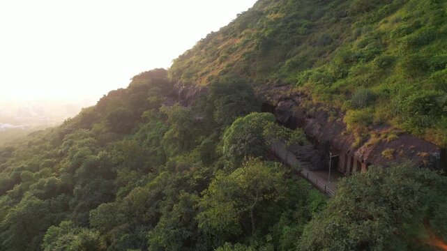 Historical Nashik Caves or Pandavleni Buddhist site in monsoon, Maharashtra, Revealing drone shot
