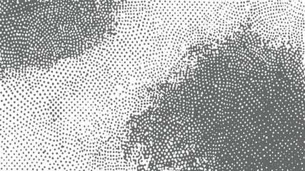 Abstract gray and white dotted pattern with varying density and irregular shapes.