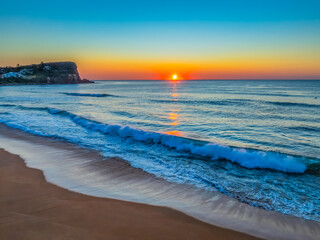 Blush Horizon: Sunrise by the Sea