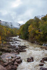 panoramic view and autumn walks along the canyon of the mountain river located in the gorge of the mountain range