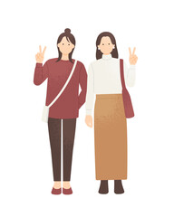 旅行先でSNS用に写真を撮る女性二人組 秋冬ファッションの女の子ベクター素材