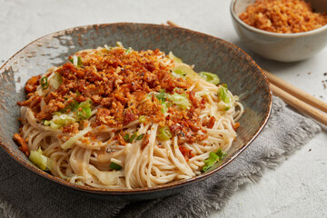 Noodles with peanut sauce and crispy topping