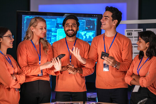 A young innovator in the near future, her smart glasses displaying an augmented reality presentation, smiles as she witnesses a breakthrough in immersive collaborative technology.