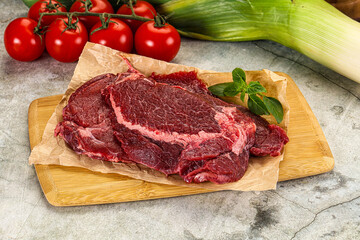 Raw beef cheeks cut for cooking