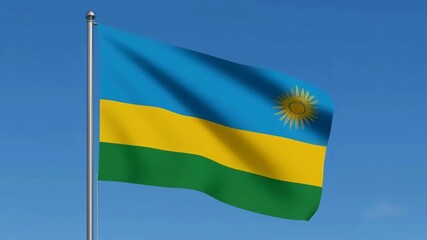 Rwandan national flag waving under blue sky