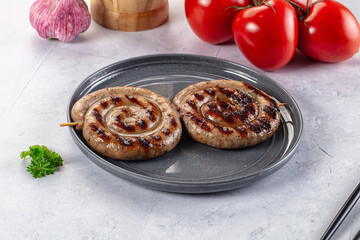 Grilled beef round circle sausages
