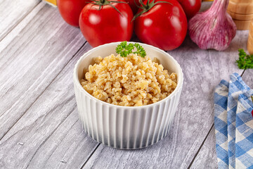 Vegan cuisine - boiled bulgur garnish